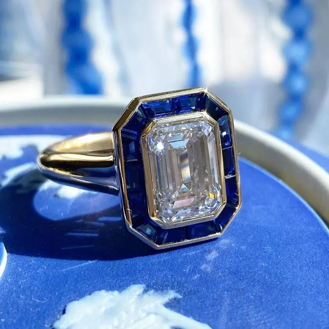 /public/photos/live/Unique Emerald Cut Moissanite Halo Ring 479 (1).webp